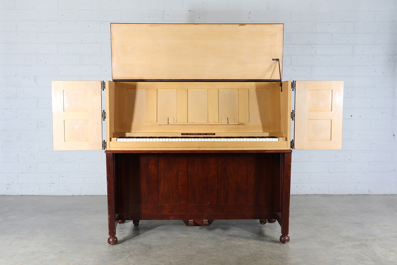 An upright Broadwood piano, as designed by Charles Robert Ashbee (1863-1942)